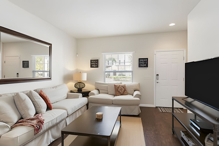 Living area 2, Disney 3BR Townhome w/ Pool & Mickey Theme, Osceola