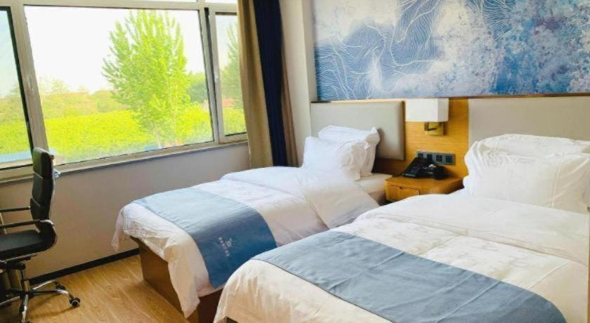 Bedroom 2, GreenTree Inn Express Qingdao Laixi High-Speed Railway Station Shenzhen Road, Qingdao