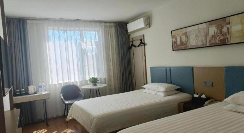 Bedroom 5, Jinjiang Inn Zibo People's Park Liuquan Road, Zibo