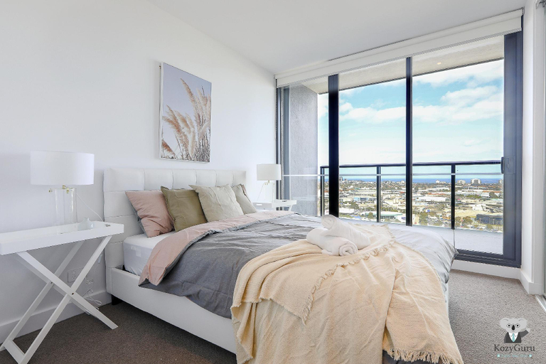 Bedroom 2, KOZYGURU Docklands Cozy Water View 1BED, Melbourne