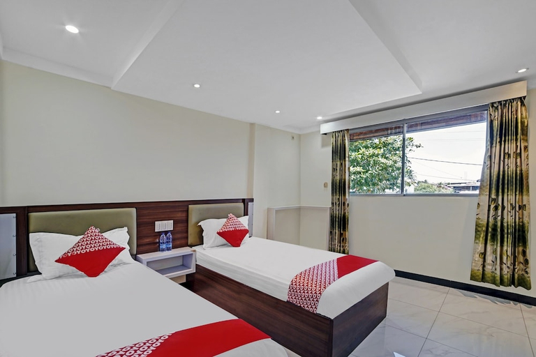 Bedroom 3, OYO 90487 Wisma Kuta Karang Baru, Lhokseumawe