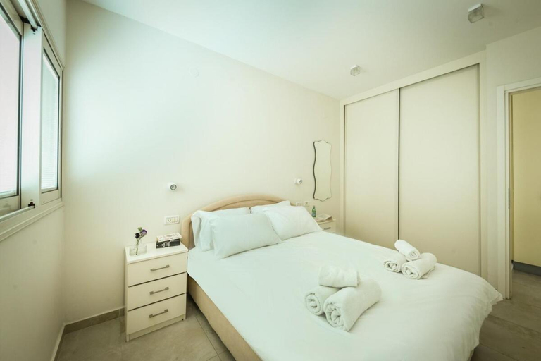 Bedroom 1, 1BR Apt Sea Breeze & Views by SeaNRent