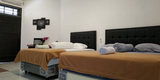 Kamar Keluarga Deluks Double atau Ranjang Lain