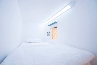 Kamar dengan Ranjang Single