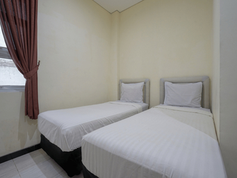 Kamar dengan Ranjang Single