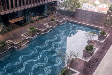 Exterior & Views 2, 2BR Cozy Pool View Kemang Village Residence Apartment with Direct Access to Mall By Travelio, Jakarta Selatan