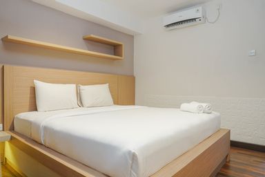 Bedroom 1, Cozy Living 1BR Tamansari The Hive Apartment By Travelio, Jakarta Timur