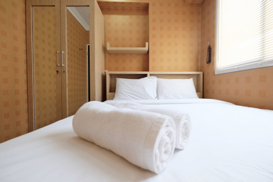 Relaxing 2BR with Pool View Mutiara Bekasi Apartment By Travelio, bekasi