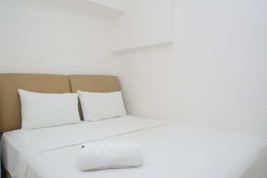 Bedroom 1, Minimalist and Stylish 1BR Bassura City Apartment By Travelio, Jakarta Timur