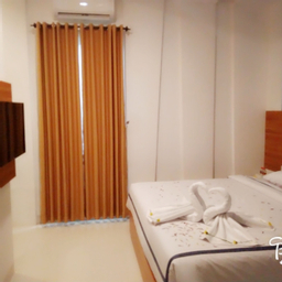 Kamar dengan Ranjang Queen