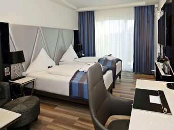 Privilege Room with twin beds and sofa