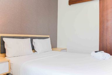 Bedroom 2, Nice and Cozy Studio at Grand Kamala Lagoon Apartment By Travelio, Bekasi