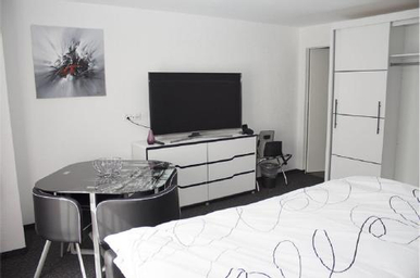 Kamar dengan Ranjang Queen