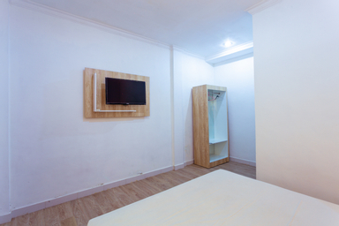 Bedroom 4, Segara Sadhu Inn Kuta by ecommerceloka, Badung
