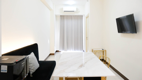 Spacey and Homey 2BR at Supermall Mansion Apartment By Travelio, surabaya