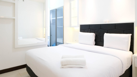 Spacey and Homey 2BR at Supermall Mansion Apartment By Travelio, surabaya