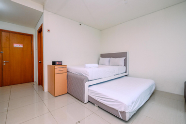 Bedroom 2, Fancy and Nice Studio Apartment at Woodland Park Residence By Travelio, Jakarta Selatan