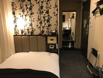 Kamar dengan Ranjang Twin