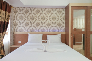 Bedroom 1, Minimalist and Comfort Studio Podomoro City Deli Medan Apartment By Travelio, Medan