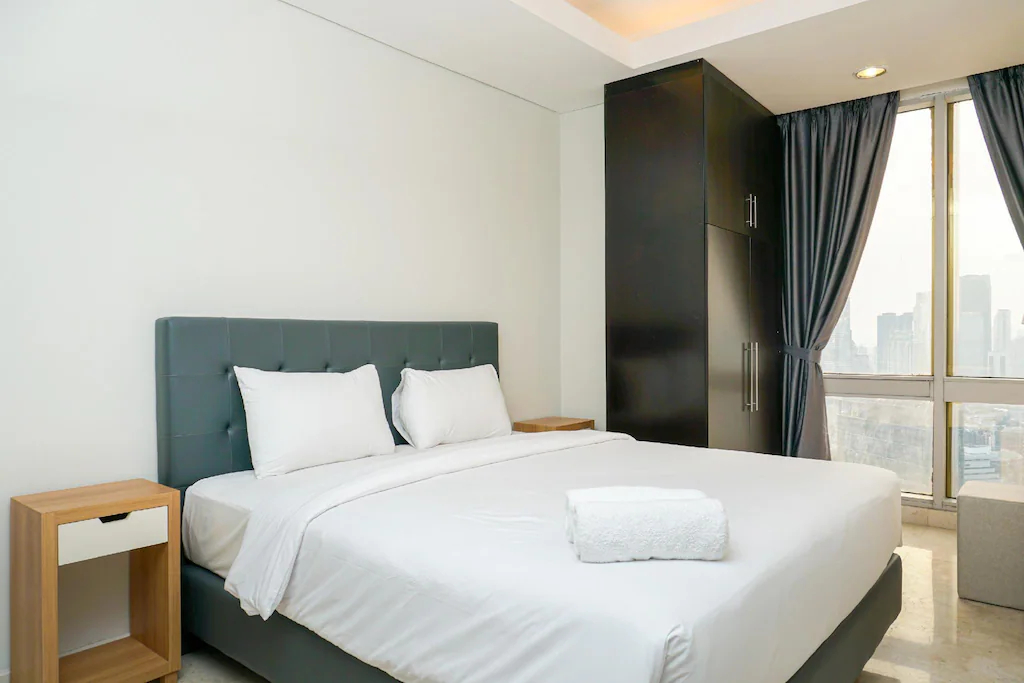 Bedroom, Modern 2BR at The Masterpiece Apt By Travelio, Jakarta Selatan
