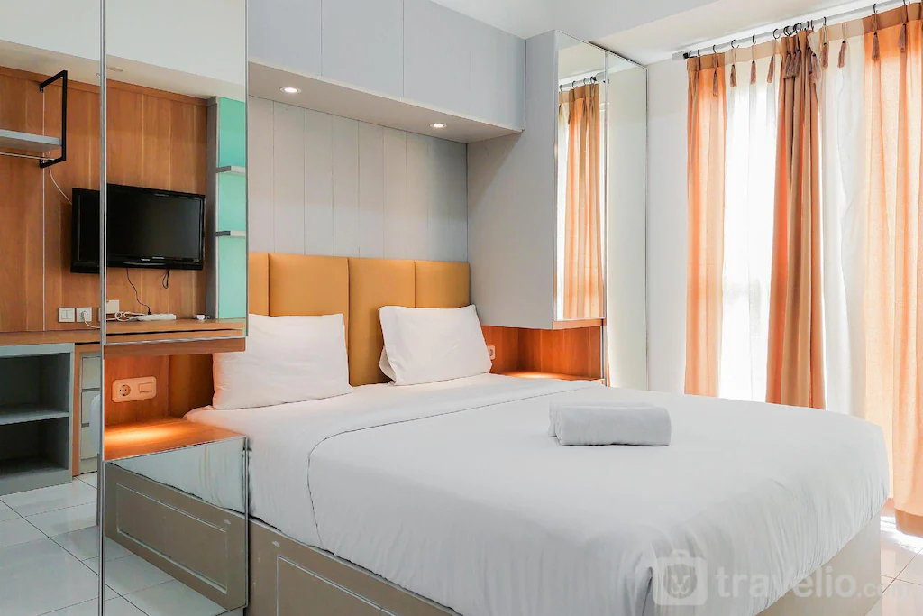 Bedroom 5, Warm Cozy Stay Studio at Casa de Parco By Travelio, South Tangerang