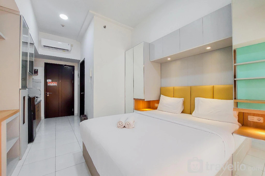 Bedroom 1, Warm Cozy Stay Studio at Casa de Parco By Travelio, South Tangerang